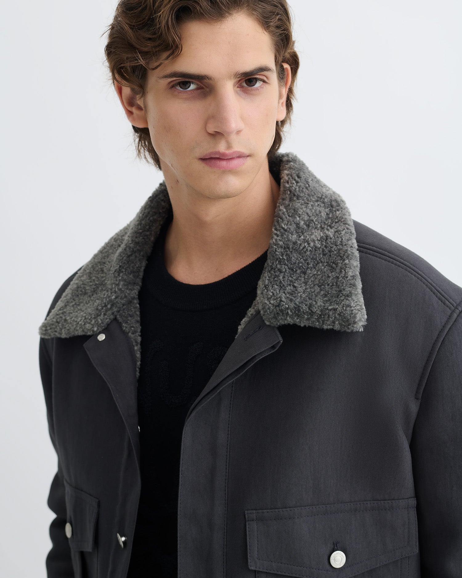 Veste oversize en coton ciré graphite avec col en fausse peau de mouton
