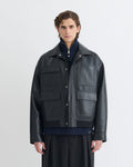 Blouson homme ample en cuir régénéré noir, multipoches, taille élastiquée