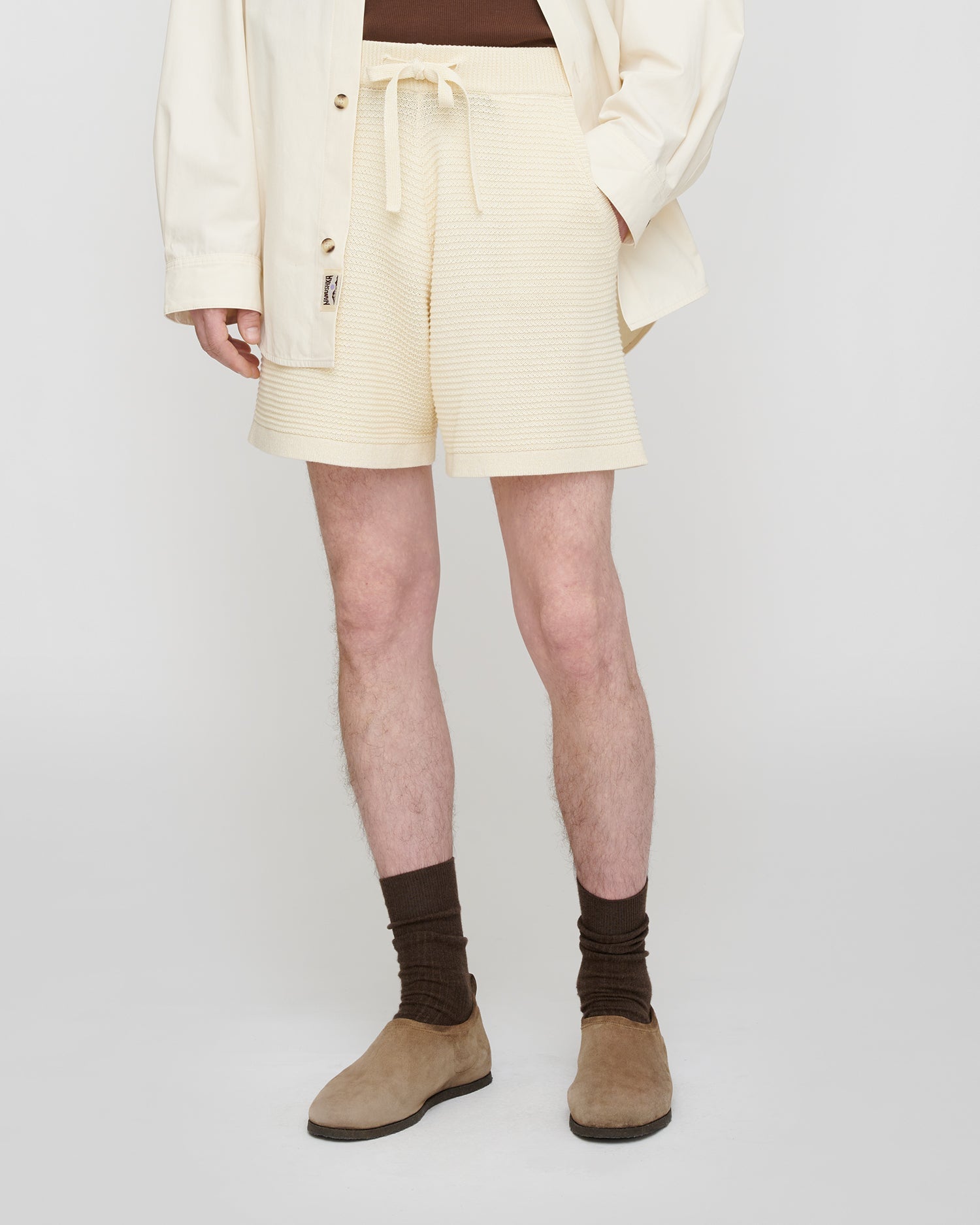 Short décontracté en tricot de dentelle au crochet couleur crème à cordon de serrage pour homme