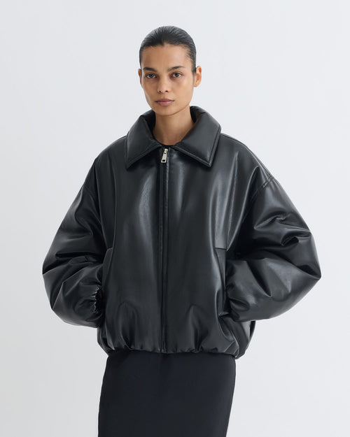 Blouson aviateur zippé en similicuir noir rembourré, coupe courte et carrée