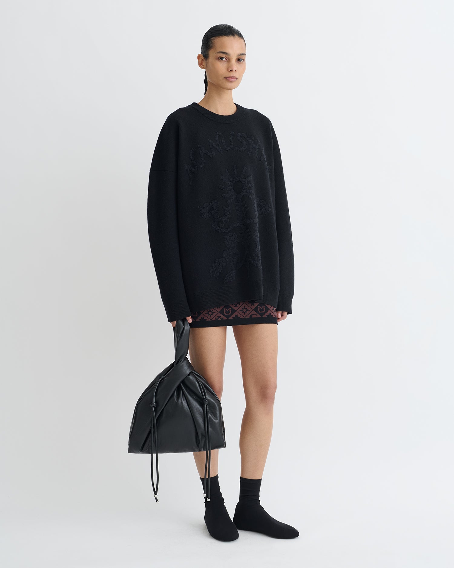 Pull en jacquard mérinos bouclette oversize à motif graphique noir et blanc cassé