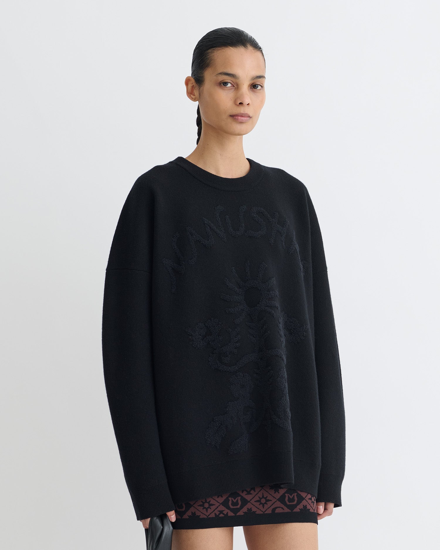 Pull en jacquard mérinos bouclette oversize à motif graphique noir et blanc cassé