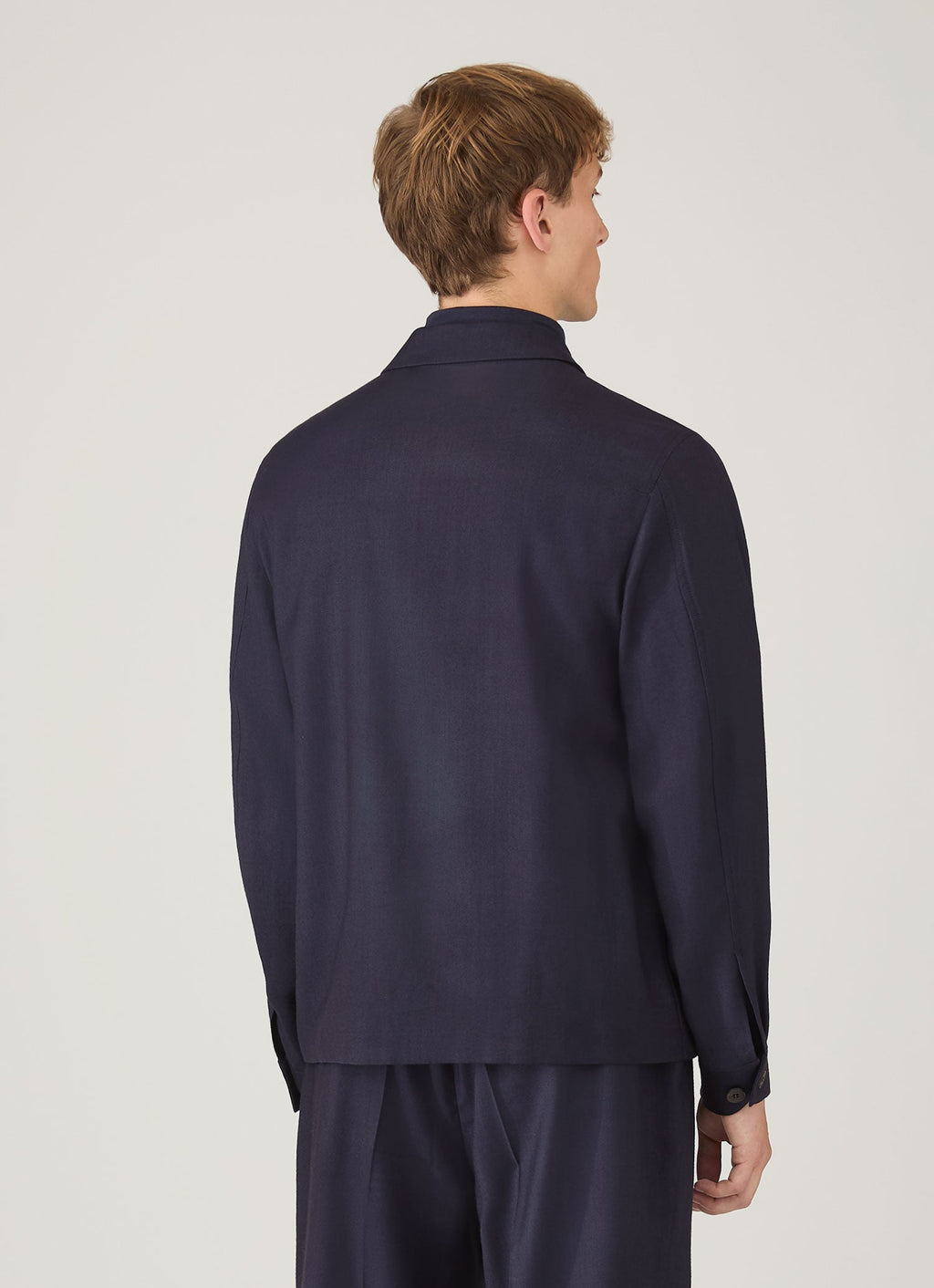 Veste boutonnée en sergé de laine bleu marine non structurée, demi-doublée, poches passepoilées