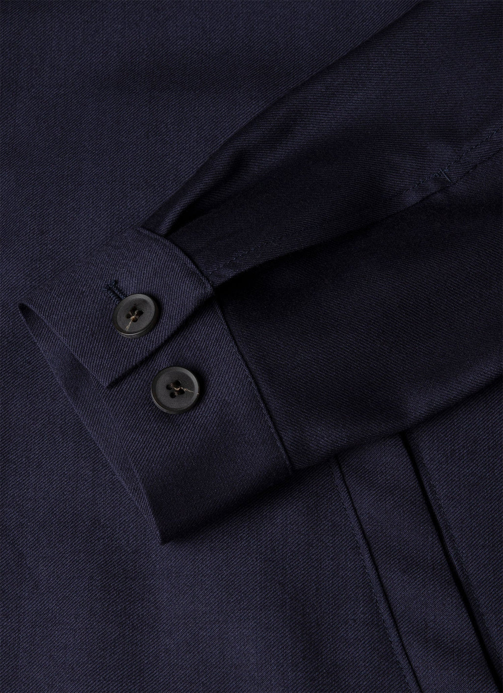Veste boutonnée en sergé de laine bleu marine non structurée, demi-doublée, poches passepoilées