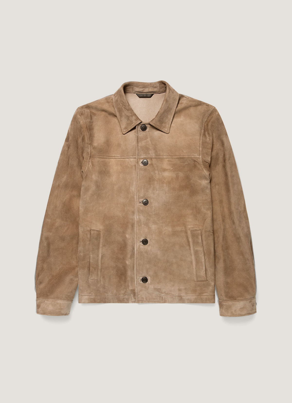 Veste en daim coupe ajustée couleur camel clair, non doublée, boutons en corne, poches passepoilées