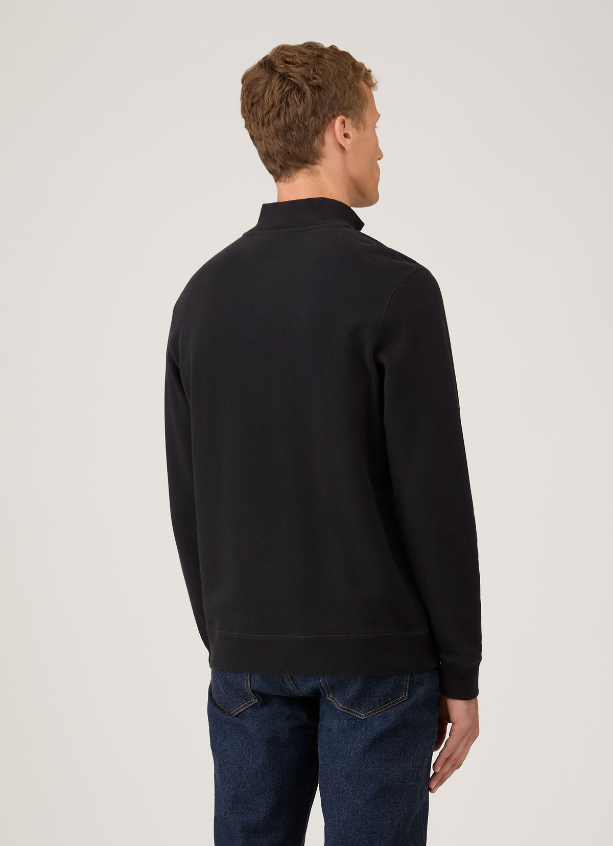 Sweat-shirt homme noir col semi-zippé manches longues en coton bouclette coupe décontractée